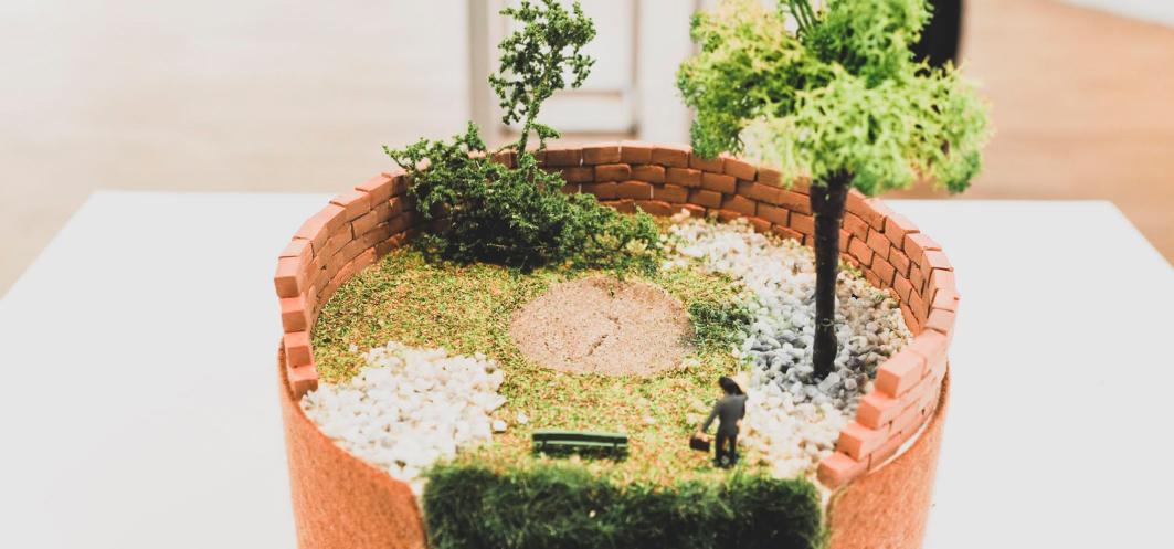 Een miniatuur voorstelling van een tuin.